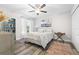 Bright bedroom with a ceiling fan, comfortable bed, and colorful accents that add a pop of personality at 533 Vista Ridge Dr, Ruskin, FL 33570