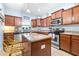 Spacious kitchen featuring granite countertops, stainless steel appliances, and a large island at 533 Vista Ridge Dr, Ruskin, FL 33570