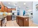 Bright kitchen featuring stainless steel appliances, granite countertops, and a center island at 533 Vista Ridge Dr, Ruskin, FL 33570