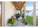 Relaxing screened porch offers a cozy seating area and views of the backyard at 533 Vista Ridge Dr, Ruskin, FL 33570