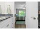 Shot of the bathroom with granite countertop that enters the bedroom at 5422 Wilkins Trl, Brooksville, FL 34602
