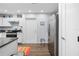 Modern kitchen with stainless steel appliances, granite countertops, and ample cabinet space at 5422 Wilkins Trl, Brooksville, FL 34602