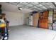 Spacious garage with ample storage space and room for multiple vehicles at 5687 Barakat Rd, Zephyrhills, FL 33541