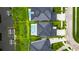 Overhead aerial view of a waterfront property featuring a private pool and manicured landscaping at 6528 Simone Shores Cir, Apollo Beach, FL 33572