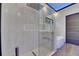 Luxurious bathroom boasts a glass walk-in shower and soaking tub with modern fixtures at 6528 Simone Shores Cir, Apollo Beach, FL 33572