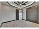 Bright bedroom showcasing gray carpet, recessed lighting, ceiling fan and modern panel closet doors at 6528 Simone Shores Cir, Apollo Beach, FL 33572