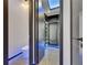 Walk-in closet featuring custom storage solutions and ample space at 6528 Simone Shores Cir, Apollo Beach, FL 33572