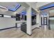 Contemporary kitchen with an island, stainless steel appliances, and stylish lighting at 6528 Simone Shores Cir, Apollo Beach, FL 33572