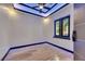 Room with wood-look tile floors, ceiling fan and recessed lights with blue accent lighting at 6528 Simone Shores Cir, Apollo Beach, FL 33572