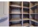 Walk-in closet has custom shelving for optimal organization and storage solutions at 6528 Simone Shores Cir, Apollo Beach, FL 33572