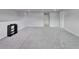 Large bonus room with neutral paint, and plush carpeting, offering versatile space at 6658 Devlin Ln, Wesley Chapel, FL 33545