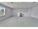 Spacious bonus room with neutral carpet, recessed lighting, and a large window offering natural light at 6658 Devlin Ln, Wesley Chapel, FL 33545