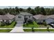 Charming two-story home with a spacious driveway and lush landscaping at 6658 Devlin Ln, Wesley Chapel, FL 33545