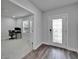 Home office featuring gray carpet and a large window for natural light at 6658 Devlin Ln, Wesley Chapel, FL 33545