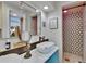Stylish bathroom boasting a vessel sink, patterned shower tiles, and contemporary decor at 675 64Th S Ave, St Petersburg, FL 33705