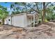 Home with a covered front porch and well-kept landscaping at 675 64Th S Ave, St Petersburg, FL 33705
