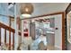 Cozy kitchen view with stainless steel appliances and decorative hanging light fixture over kitchen table at 675 64Th S Ave, St Petersburg, FL 33705