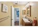 Bathroom showcasing stylish fixtures, vanity with granite counters, and towel bar at 6897 18Th N St, St Petersburg, FL 33702