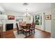 Cozy dining room with hardwood floors and large window overlooking the backyard at 6897 18Th N St, St Petersburg, FL 33702