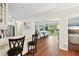 The open floorplan reveals the living room through the dining room to the kitchen at 6897 18Th N St, St Petersburg, FL 33702