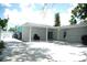 Large backyard with covered patio area perfect for outdoor entertaining at 7510 N Tampania Ave, Tampa, FL 33614