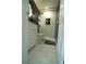Updated bathroom with glass enclosed shower, marble floors, and updated fixtures at 7510 N Tampania Ave, Tampa, FL 33614