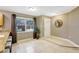 Cozy entryway with natural light, a decorative mirror, and convenient access to the breakfast bar at 821 52Nd S Ave, St Petersburg, FL 33705