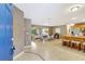 Open living space featuring a dining area, kitchen with breakfast bar, and comfortable seating at 821 52Nd S Ave, St Petersburg, FL 33705