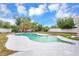 Refreshing pool surrounded by lush landscaping and a spacious patio at 821 52Nd S Ave, St Petersburg, FL 33705