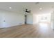 Spacious living room featuring modern floors, recessed lighting, and a ceiling fan at 8444 15Th N Way, St Petersburg, FL 33702