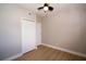Nice bedroom with wood floors, ceiling fan, closet and a freshly painted at 8502 Grapefruit Ave, Tampa, FL 33619