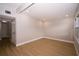 Bright bedroom with light wood floors, neutral walls and recessed lighting at 8502 Grapefruit Ave, Tampa, FL 33619