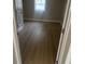 Bedroom featuring modern flooring, neutral paint, and natural light at 8502 Grapefruit Ave, Tampa, FL 33619