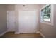Bedroom with closet, window and fresh paint at 8502 Grapefruit Ave, Tampa, FL 33619