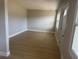 Bright living room with clean lines, fresh paint, and ample natural light at 8502 Grapefruit Ave, Tampa, FL 33619