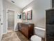 This bathroom has a double sink vanity and a walk-in shower at 8514 Manassas Rd, Tampa, FL 33635
