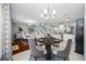 Formal dining area open to living and kitchen, great for entertaining guests or Gathering at 8514 Manassas Rd, Tampa, FL 33635