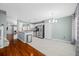 Modern kitchen features stainless steel appliances and an adjacent dining area, perfect for Gathering gatherings at 8514 Manassas Rd, Tampa, FL 33635