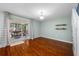 Cozy room with sliding doors and hardwood floors, perfect for relaxing or entertaining guests at 8514 Manassas Rd, Tampa, FL 33635