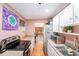 Bright kitchen featuring updated appliances and plenty of storage space, creating a functional and stylish cooking area at 8556 91St Ter, Seminole, FL 33777