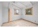 Bedroom featuring two windows that provide lots of natural light and tile floors at 9213 W Robson St, Tampa, FL 33615