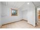 Bedroom featuring one window that provides natural light and tile floors at 9213 W Robson St, Tampa, FL 33615