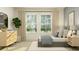 Bedroom showcasing a bed, side tables, a potted plant, modern decor, and a large window at 9604 Runaway Breeze Dr, Land O Lakes, FL 34637