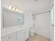 Clean bathroom featuring a large vanity, shower and bath combination at 9731 Meadow Field Cir, Tampa, FL 33626