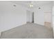 Expansive bedroom featuring bright natural light and neutral carpeting at 9731 Meadow Field Cir, Tampa, FL 33626