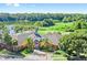 Beautiful clubhouse with a view of the golf course and lake at 9731 Meadow Field Cir, Tampa, FL 33626