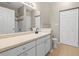 Bathroom featuring a spacious vanity, tile floor, and shower-tub combo at 9842 Lake Chase Island Way, Tampa, FL 33626
