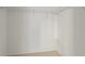 Empty closet space offering ample storage with a wire shelf at 9842 Lake Chase Island Way, Tampa, FL 33626