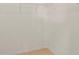 Bright empty closet with a simple wire shelf at 9842 Lake Chase Island Way, Tampa, FL 33626