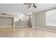 Open-concept living area with breakfast bar and ample space for entertaining at 9842 Lake Chase Island Way, Tampa, FL 33626